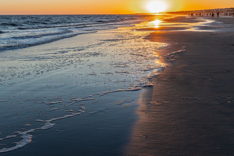 Solnedgång på isle palmstrand arkivfoton