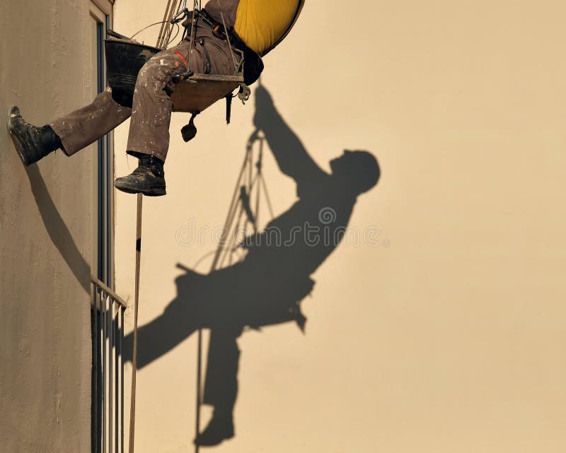 Sombra del trabajador de construcción fotografía de archivo Sombra del trabajador de construcción fotografía de archivo