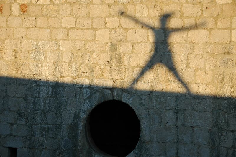 Sombra Que Salta En La Pared Imagen de archivo Imagen de pared