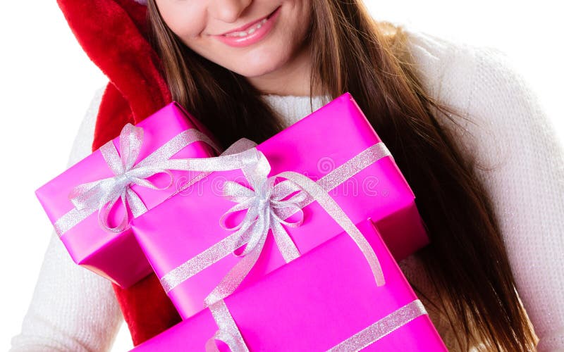 Sombrero del ayudante de santa de la mujer con muchas cajas de regalo rosadas imagenes de archivo Sombrero del ayudante de santa de la mujer con muchas cajas de regalo rosadas imagenes de archivo