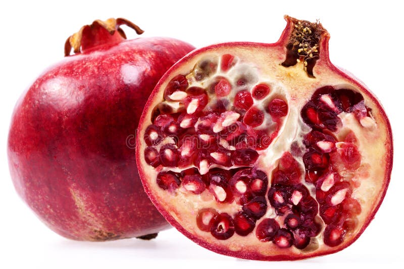 Some fruits of red pomegranate isolated on white background, close up.