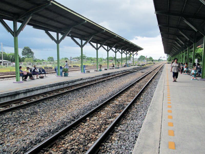 Some people are waiting for the train