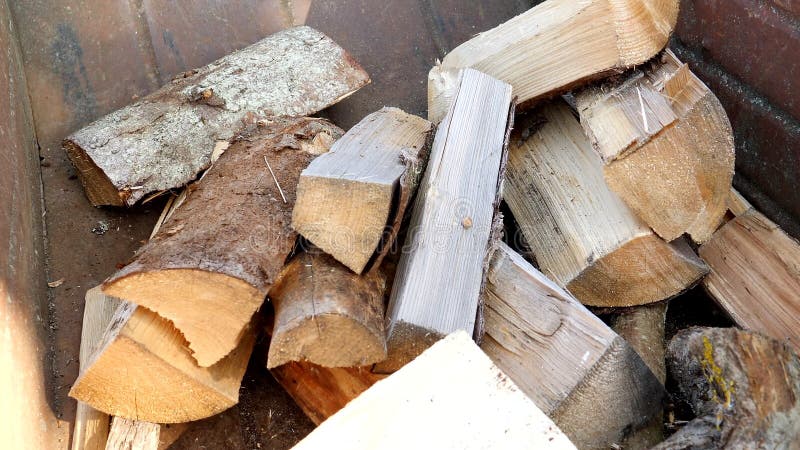 Some of the thrown chopped firewoods on the storage stock video