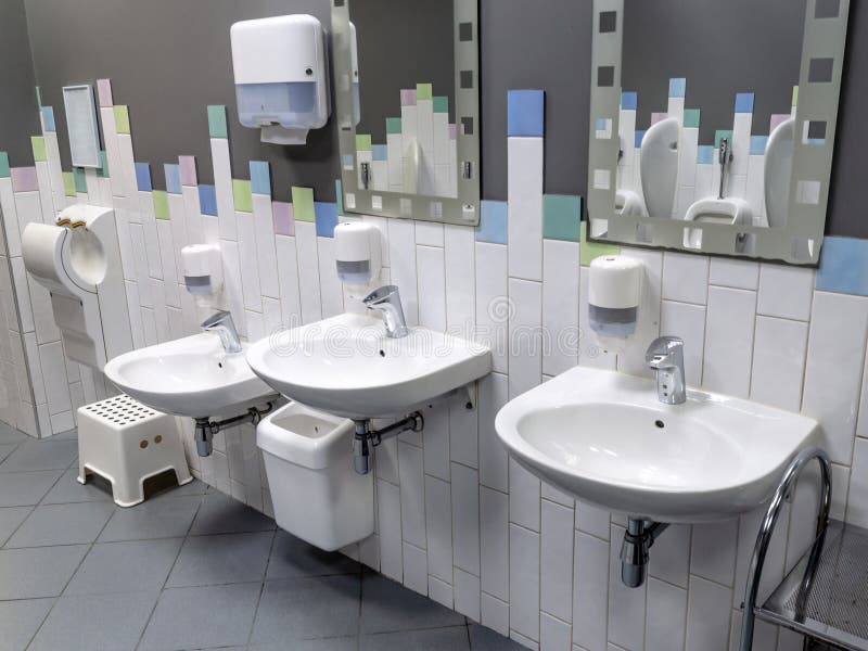 Some Urinals in a Public Restroom Stock Photo Image of urinal, white