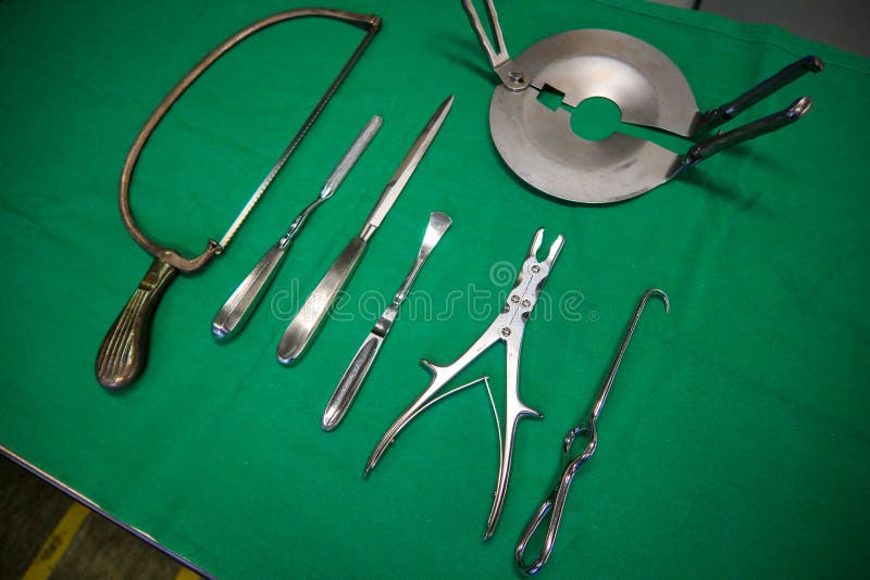 Various Instruments for an Amputation Lie on a Surgical Cloth Stock