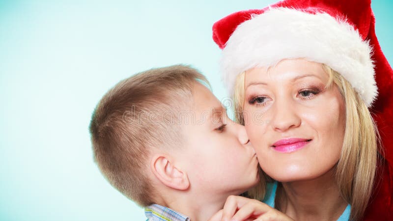 Son is kissing his mother stock photos Son is kissing his mother stock photos