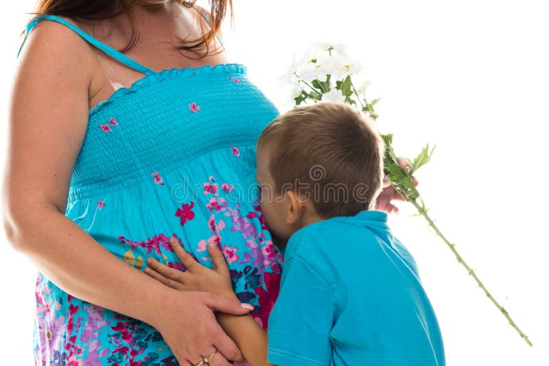 Son Kissing Pregnant Belly Of His Mother Stock Photo Image Of