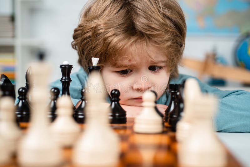 Kids Early Development. Pupil Kid Thinking about His Next Move in a Game of  Chess. Stock Image - Image of child, chess: 172839087