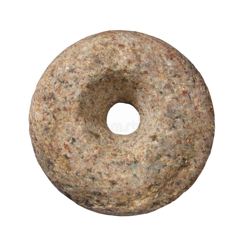 Single rock carved in to a circle shape like a doughnut, with a hole in the center. Isolated on white. Single rock carved in to a circle shape like a doughnut, with a hole in the center. Isolated on white.