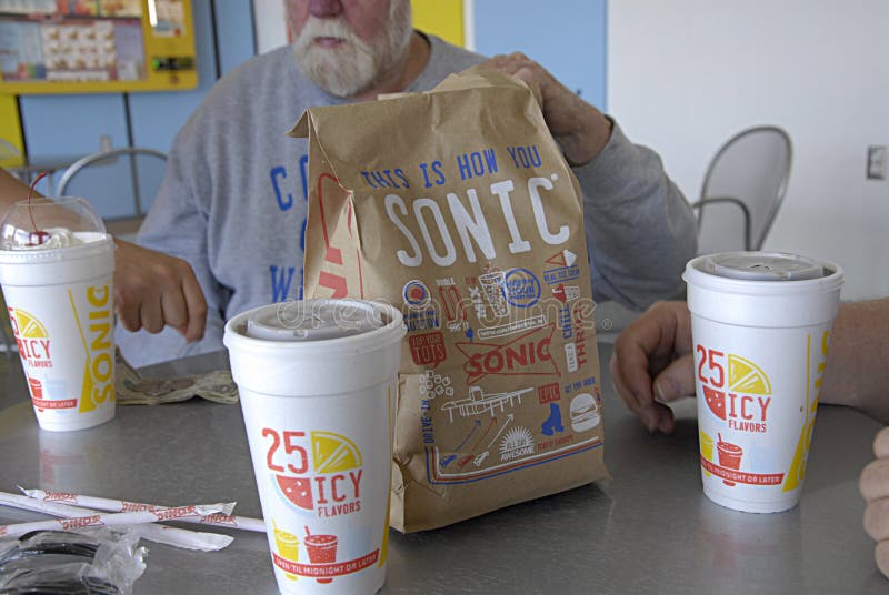 LEWISTON/IDAHO /USA- Sonic fast food drive restaurant chain order bood at drive way and sitting table sonic burger menu 29 May 2014 (Photo by Francis Dean/Deanpictures). LEWISTON/IDAHO /USA- Sonic fast food drive restaurant chain order bood at drive way and sitting table sonic burger menu 29 May 2014 (Photo by Francis Dean/Deanpictures)