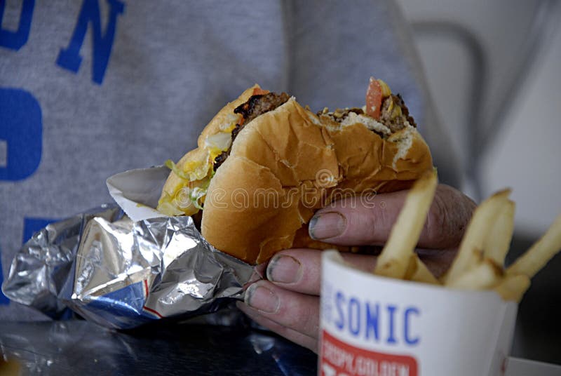 LEWISTON/IDAHO /USA- Sonic fast food drive restaurant chain order bood at drive way and sitting table sonic burger menu 29 May 2014 (Photo by Francis Dean/Deanpictures). LEWISTON/IDAHO /USA- Sonic fast food drive restaurant chain order bood at drive way and sitting table sonic burger menu 29 May 2014 (Photo by Francis Dean/Deanpictures)