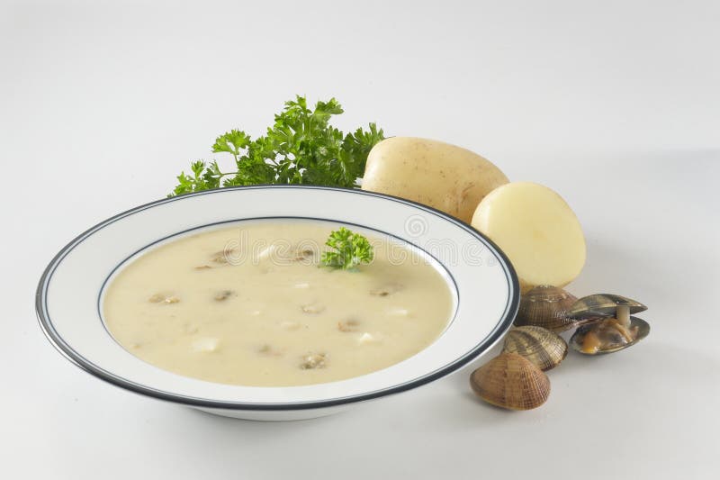 Sopa cremosa de la almeja de la patata imagen de archivo Sopa cremosa de la almeja de la patata imagen de archivo
