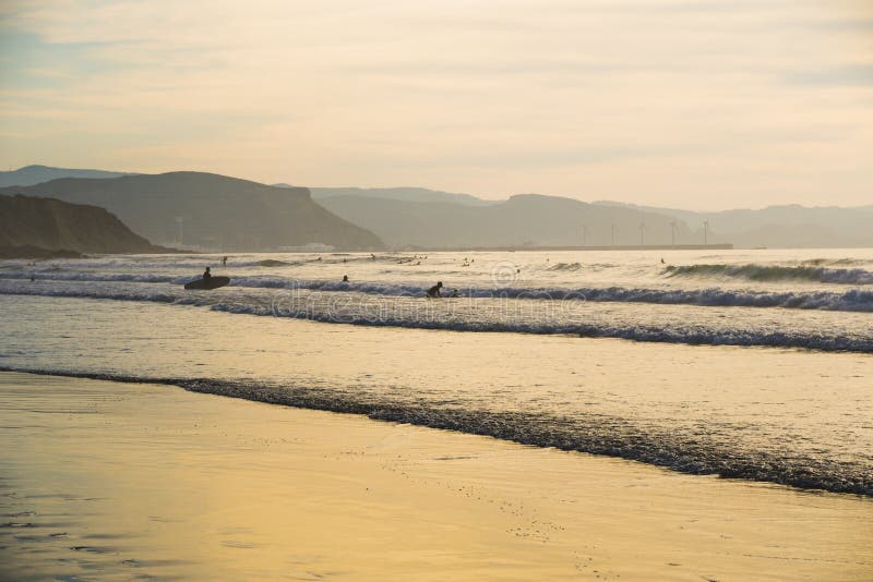 Sopelana Beach, Spain - August 16 2019: Scenic view of a beautiful sunset in Basque Country, north of Spain