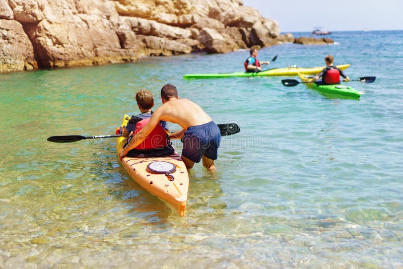 Sorrento/Italy - 20 August 2018: Kayaking and Canoeing School. Professional instructor teaching a beginner stock photos Sorrento/Italy - 20 August 2018: Kayaking and Canoeing School. Professional instructor teaching a beginner stock photos