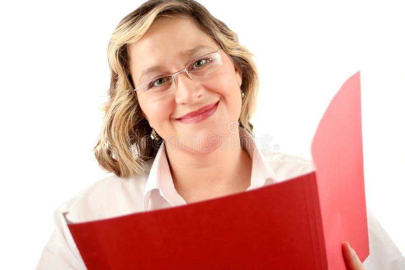 Friendly smiling woman with file folder that could be a doctor or a businesswoman. Friendly smiling woman with file folder that could be a doctor or a businesswoman