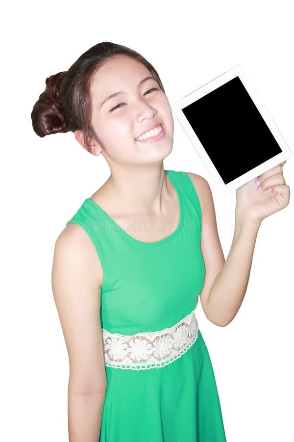 Sorriso bonito da mulher e mostrar o PC da tabuleta imagem de stock Sorriso bonito da mulher e mostrar o PC da tabuleta imagem de stock