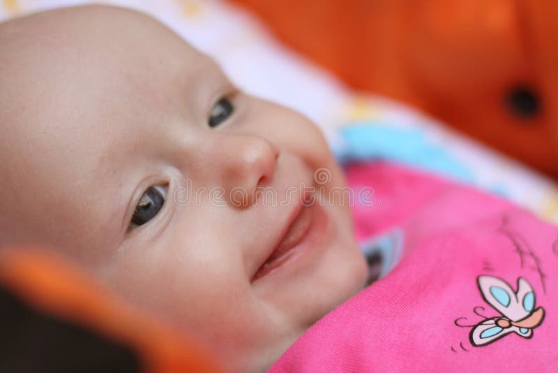 Sorriso de bebé imagem de stock