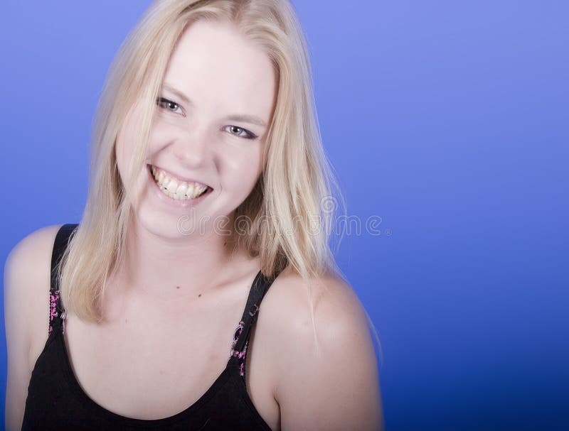 Sorriso louro imagem de stock royalty free Sorriso louro imagem de stock royalty free