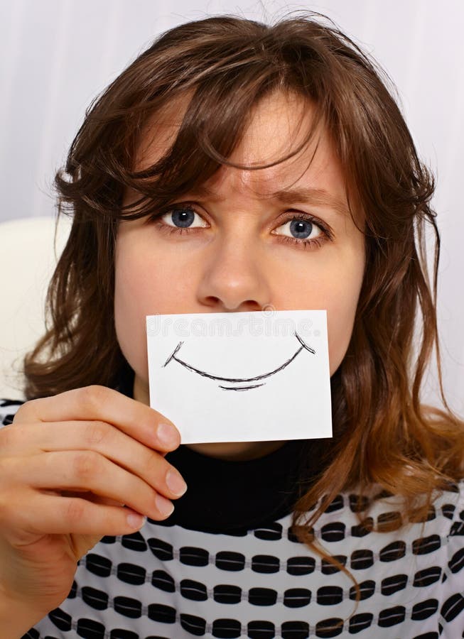 Tired woman smiles as may - portrait close up. Tired woman smiles as may - portrait close up