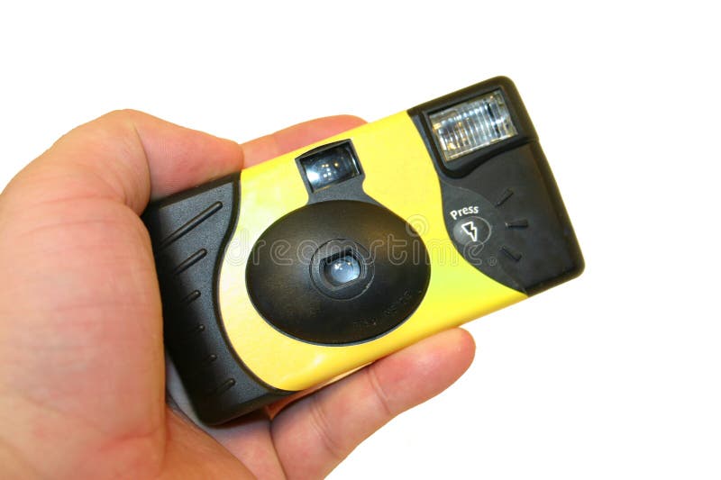 Sostener una cámara disponible foto de archivo Sostener una cámara disponible foto de archivo