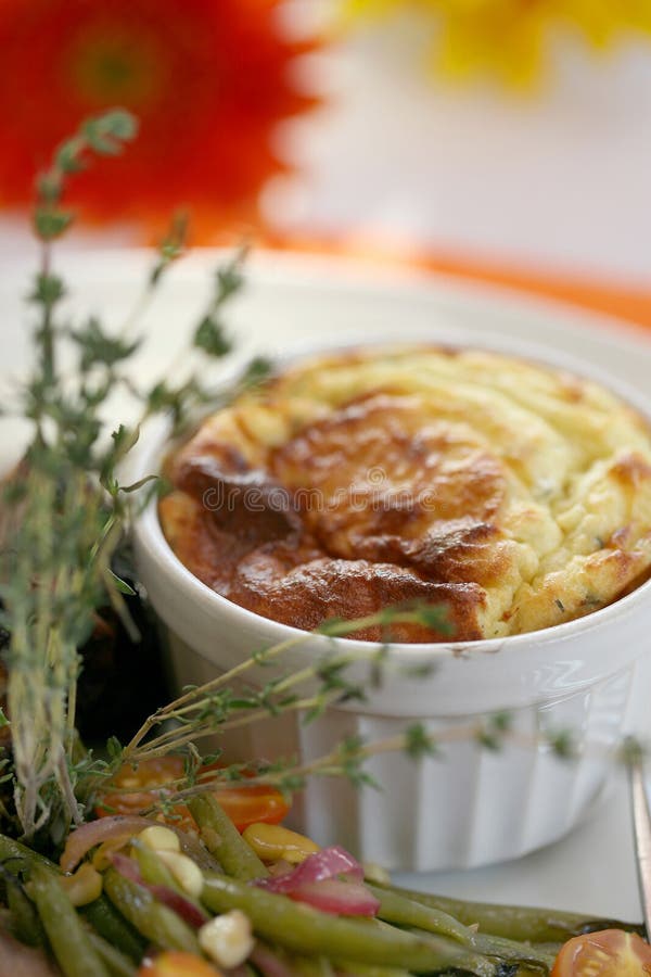 Thyme Souffle in a white ramiken. Thyme Souffle in a white ramiken