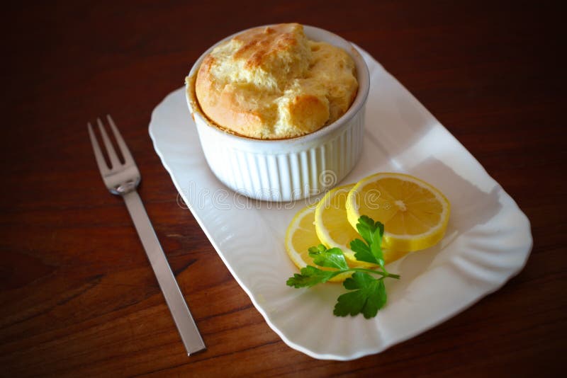 Soufflé with slices of lemons