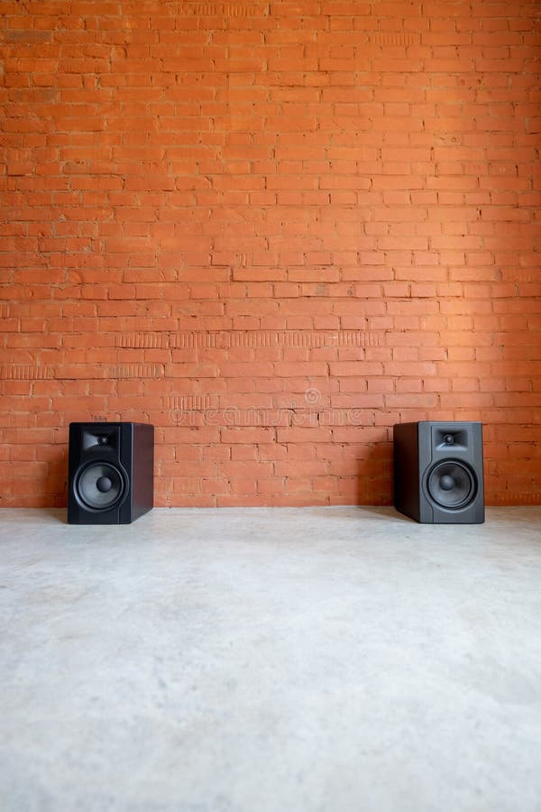 Speakers on a Wall of Building .Loud Speaker in Factory Stock Photo