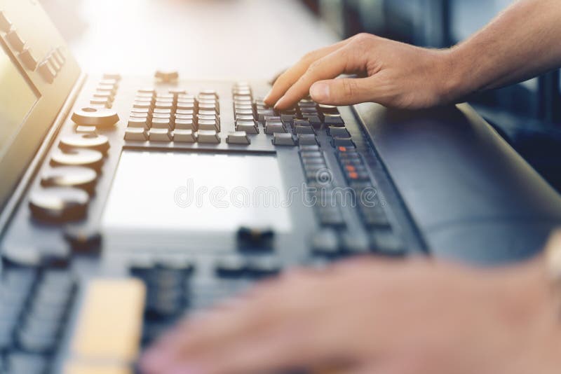 Sound Technician or Lights Technicians Control the Music Show in