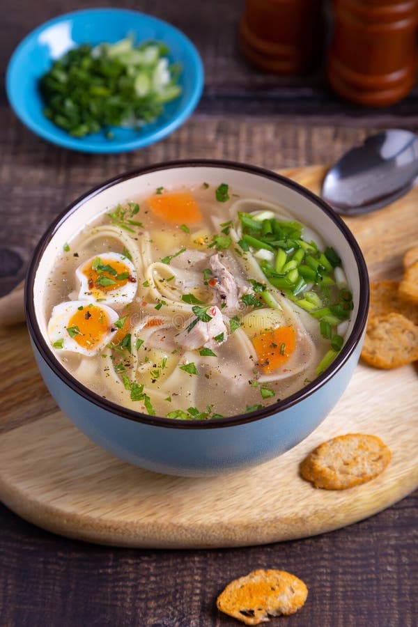 Soup with Chicken, Noodles, Potatoes, Quail Eggs and Carrots. Seasoned ...