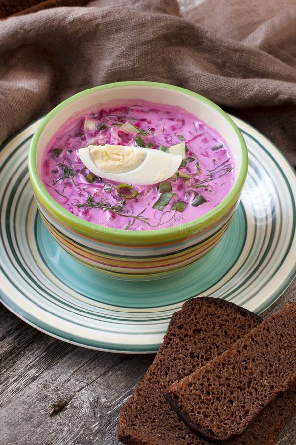 Soup with fresh beets served cold with sour cream