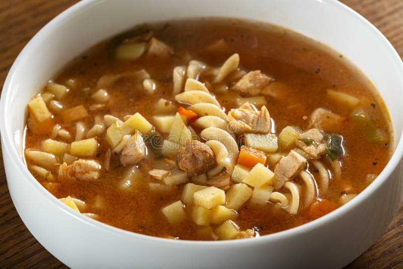 Soup with fusilli, chicken meat and vegetables