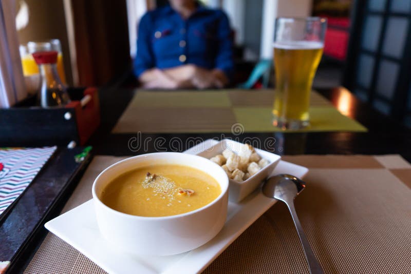 Soup puree sprinkled with sesame seeds, croutons of white bread stock images Soup puree sprinkled with sesame seeds, croutons of white bread stock images
