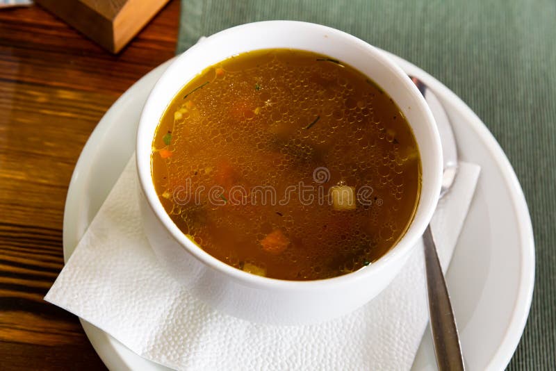 Soup with veal and pasta stock images