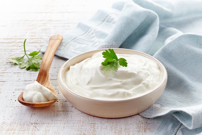 Sour cream. In a bowl royalty free stock photography
