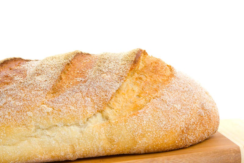 Loaf of sour dough bread isolated over white background.