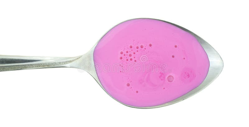 Sour stomach medicine on a spoon. Top view of sour stomach and anti-diarrhea medicine on a metal spoon atop a white background royalty free stock photos Sour stomach medicine on a spoon. Top view of sour stomach and anti-diarrhea medicine on a metal spoon atop a white background royalty free stock photos