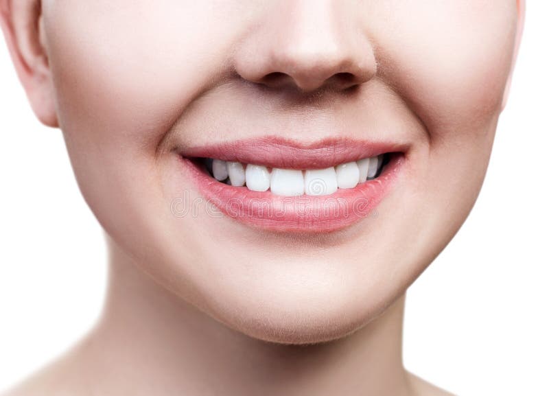 Sourire sain en gros plan de jeune femme photographie stock Sourire sain en gros plan de jeune femme photographie stock