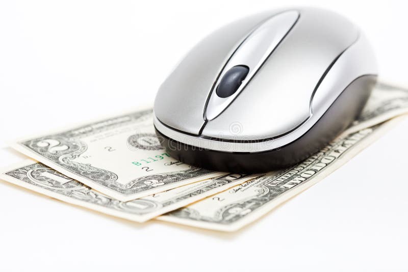 Souris d'ordinateur sur des dollars photos stock Souris d'ordinateur sur des dollars photos stock