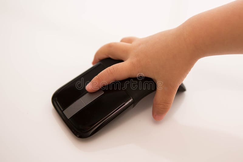 Souris de clic d'enfant photographie stock libre de droits Souris de clic d'enfant photographie stock libre de droits