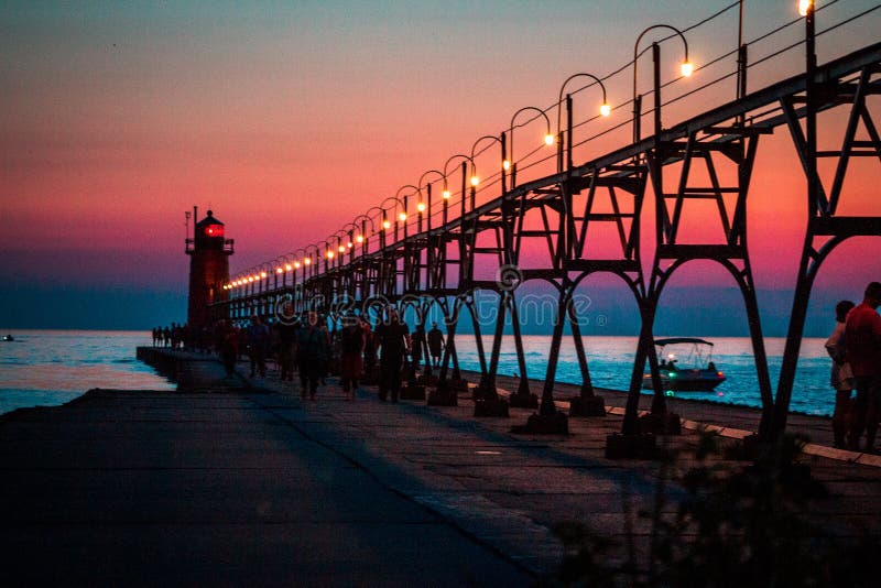 South Haven Michigan`s Lighthouse and Pier during Blue Hour and Sunset