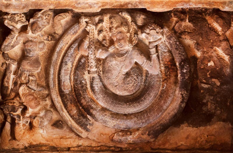 South Indian carvings, ancient gods on relief of the 7th century temple`s ceiling,f Karnataka. Ancient asian artwork