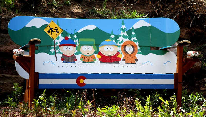 This is a South Park cartoon themed bench made of snow boards. South Park is an adult animated sitcom that was created by Trey Parker and Matt Stone.  It is on the Comedy Central television network.  The show revolves around four boys Stan Marsh, Kyle Broflovski, Eric Cartman, and Kenny McCormick.  It follows their adventures around a town in Colorado called South Park.  The picture was taken in Manitou Springs, CO. This is a South Park cartoon themed bench made of snow boards. South Park is an adult animated sitcom that was created by Trey Parker and Matt Stone.  It is on the Comedy Central television network.  The show revolves around four boys Stan Marsh, Kyle Broflovski, Eric Cartman, and Kenny McCormick.  It follows their adventures around a town in Colorado called South Park.  The picture was taken in Manitou Springs, CO.