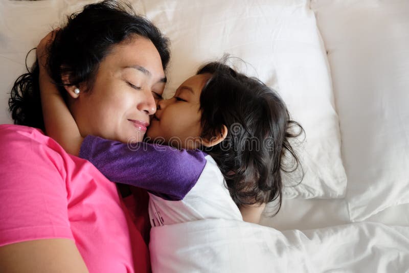 Mom Sleep Son Romance - Southeast Asian Boy Showing His Love, Hugging and Kissing His Mother while  Still on Bed in the Morning. Asian Ethnicity Domestic Stock Image - Image  of joyful, morning: 166303281