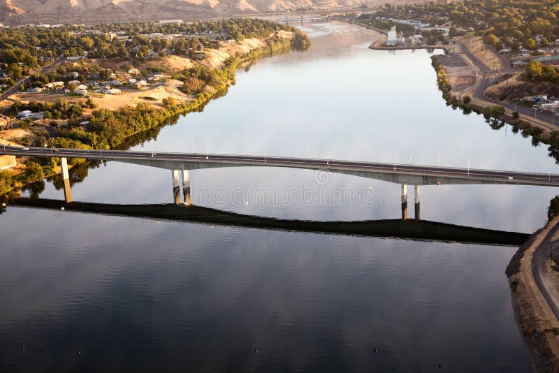 An early morning areal view from a hot air balloon of the Southway Bridge over the Snake River with Clarkston Washington on the left, and Lewiston Idaho on the right. An early morning areal view from a hot air balloon of the Southway Bridge over the Snake River with Clarkston Washington on the left, and Lewiston Idaho on the right.