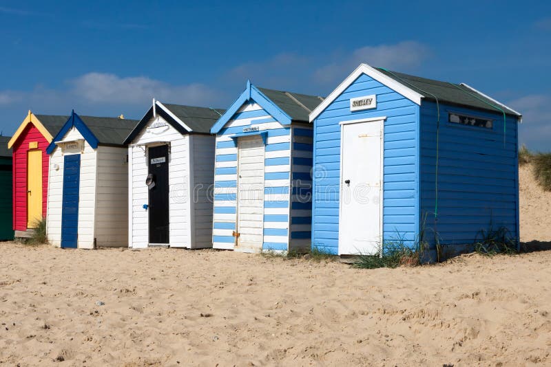 SOUTHWOLD, SUFFOLK/UK - JUNE 2 : Colourful Beach huts in Southwold Suffolk on June 2, 2010. SOUTHWOLD, SUFFOLK/UK - JUNE 2 : Colourful Beach huts in Southwold Suffolk on June 2, 2010