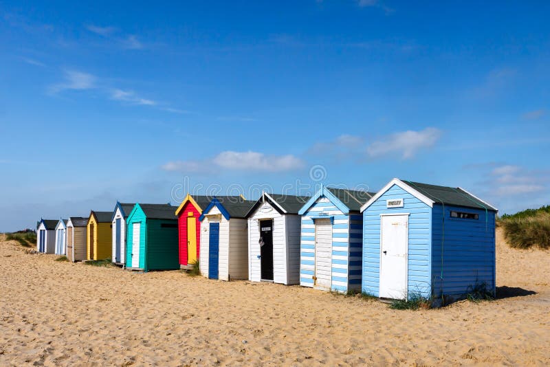 SOUTHWOLD, SUFFOLK/UK - JUNE 2 : Colourful Beach huts in Southwold Suffolk on June 2, 2010. SOUTHWOLD, SUFFOLK/UK - JUNE 2 : Colourful Beach huts in Southwold Suffolk on June 2, 2010