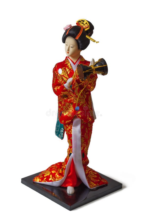 Souvenir doll-girl in red Japanese kimono