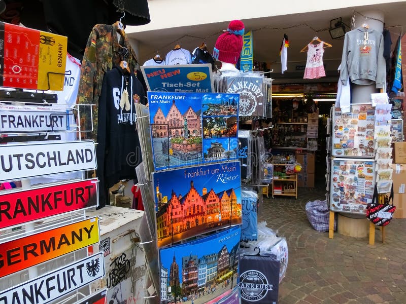 Souvenir Shops with Different Goods, View through the Glass. Editorial