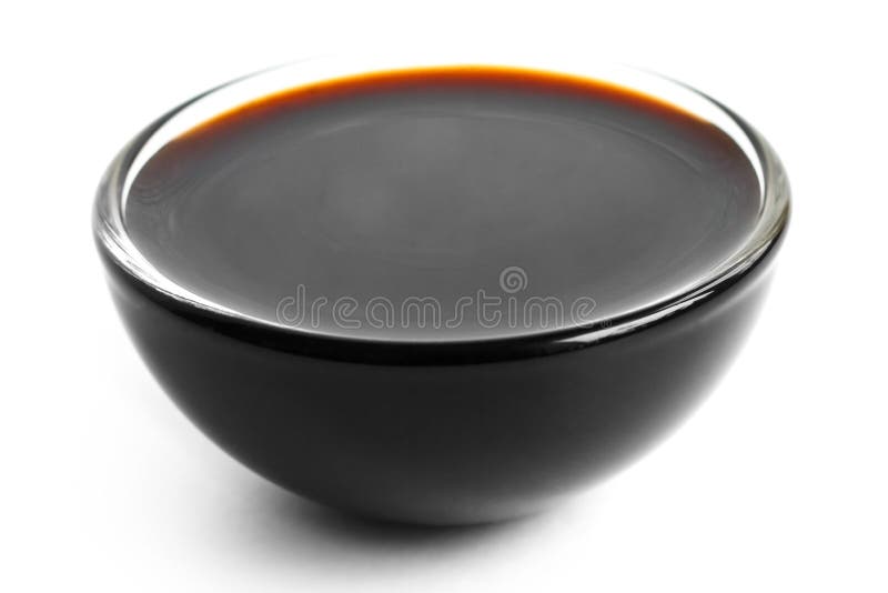 Soya kumberland w małym szklanym naczyniu Na biel obrazy stock Soya kumberland w małym szklanym naczyniu Na biel obrazy stock