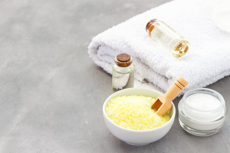 Spa accessories - sea salts, towel, oil and cream stock image Spa accessories - sea salts, towel, oil and cream stock image